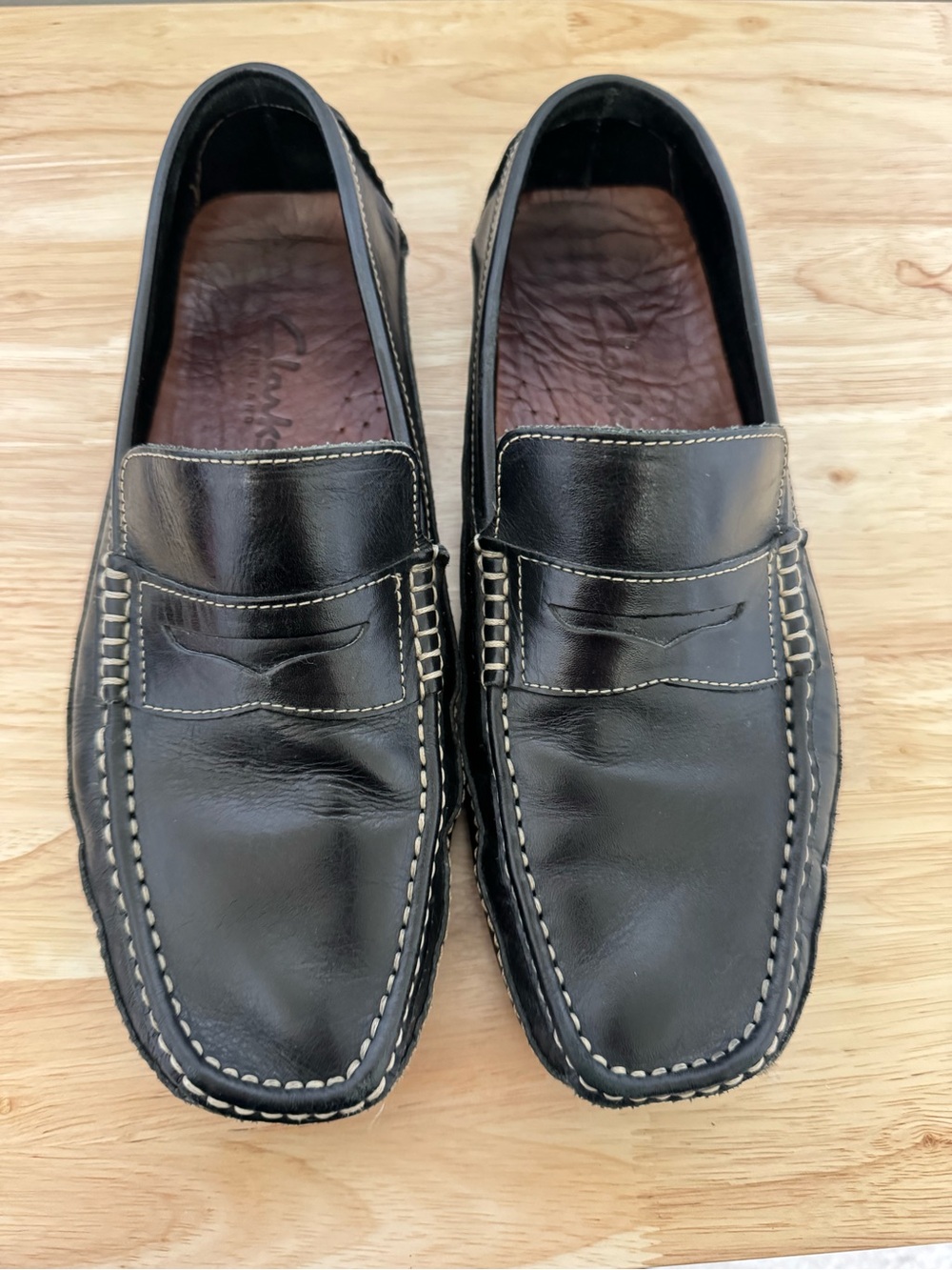 Clarks Black Leather Penny Loafers with Contrast Stitching